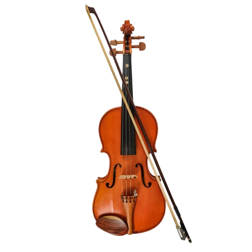 81 - A child's violin, length of back 31cm - with box, cased.
