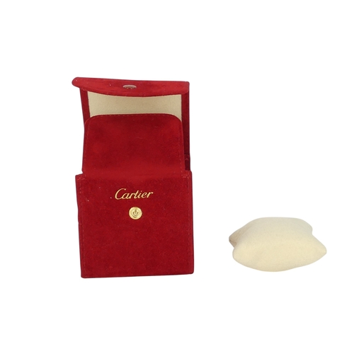 86 - A red plush jewellery box - stamped Cartier.