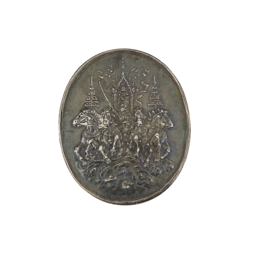 90 - A Thai royal commemorative white metal token - oval decorated with horses and script verso, together... 