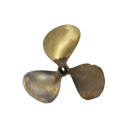 91 - A bronze boat propeller - 34cm diameter.