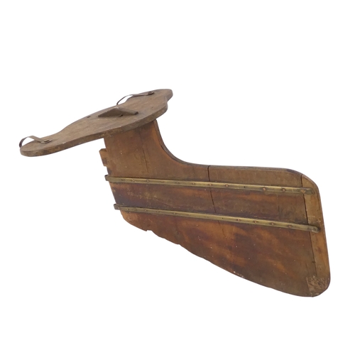 92 - A mahogany skiff rudder - with brass binding and copper patches, 40cm.