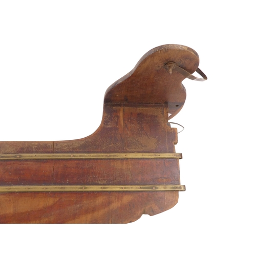 92 - A mahogany skiff rudder - with brass binding and copper patches, 40cm.