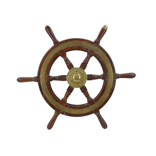 93 - A late 19th century teak ship's wheel - with brass binding, hub and brass tipped handle to top, 63cm... 