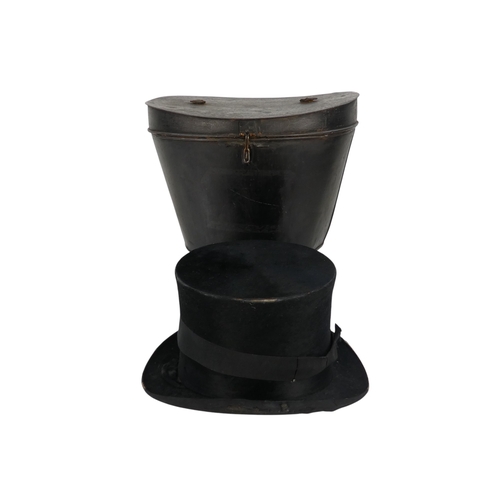 97 - A late 19th century top hat - marked 6 3/4, within a black japanned tin hat box.