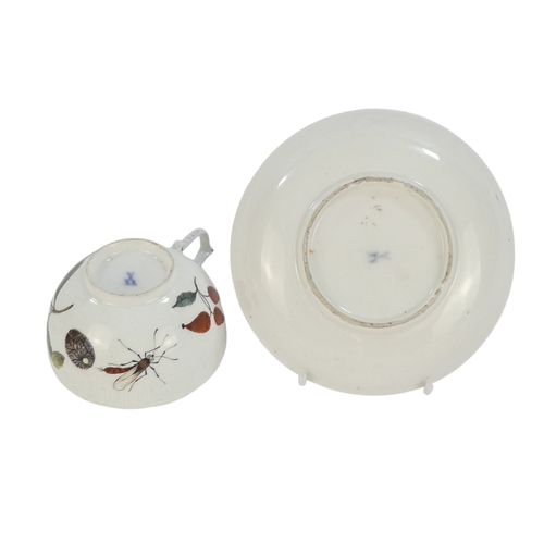 A late 18th century Meissen tea cup and associated saucer - decorated ...
