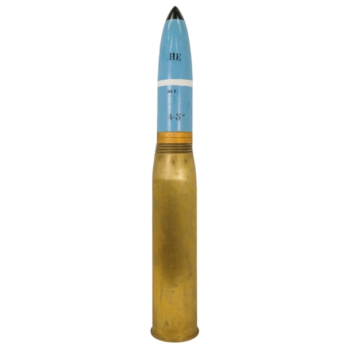 A 4.5' brass shell case - dated 1961, fitted with a dummy projectile ...