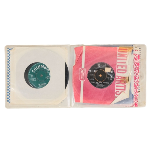 121 - A collection of 45rpm vinyl records - to include Chris Montez, Status Quo, The Moody Blues, James Br... 