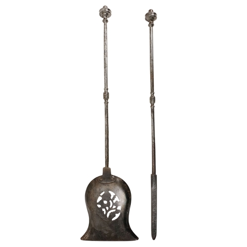 131 - A steel fire shovel - 73cm long, together with a steel fire poker, 71cm long.