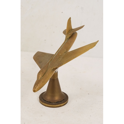 144 - A brass aeroplane mascot - height 15cm, length 20cm.