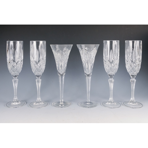 150 - A pair of Waterford crystal glass champagne flutes, boxed - together with four other champagne flute... 