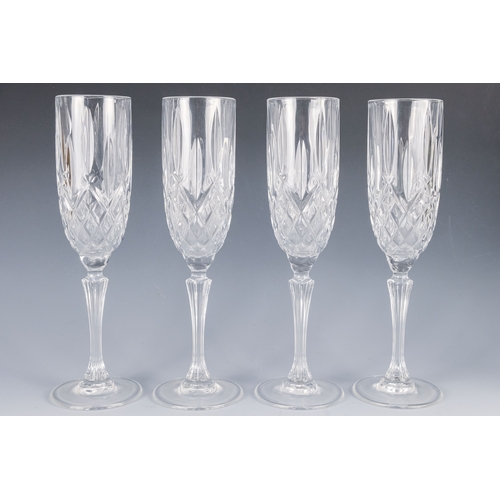 150 - A pair of Waterford crystal glass champagne flutes, boxed - together with four other champagne flute... 
