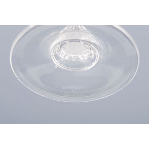 150 - A pair of Waterford crystal glass champagne flutes, boxed - together with four other champagne flute... 