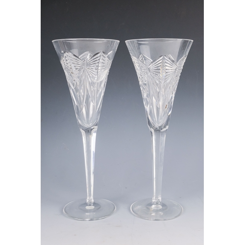 150 - A pair of Waterford crystal glass champagne flutes, boxed - together with four other champagne flute... 