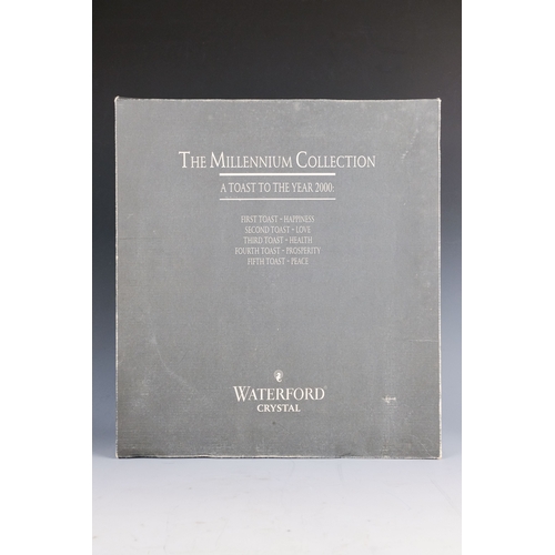 150 - A pair of Waterford crystal glass champagne flutes, boxed - together with four other champagne flute... 