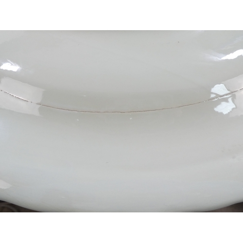 201 - A 20th century Delft charger - decorated with an image of a cavalier within a foliate border, 41cm d... 