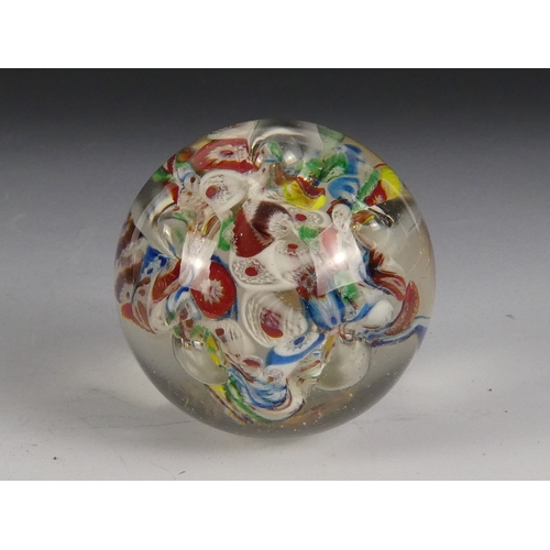 205 - A Wedgwood glass paperweight - set with an amber flower, 7cm diameter, together with four other simi... 