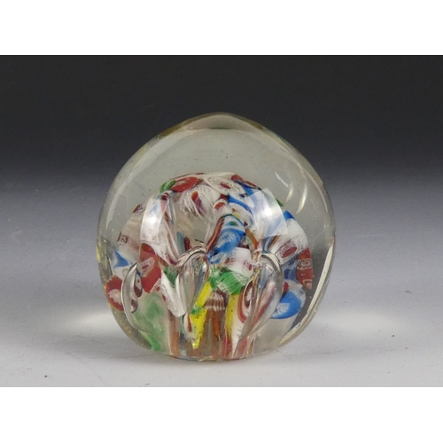 205 - A Wedgwood glass paperweight - set with an amber flower, 7cm diameter, together with four other simi... 