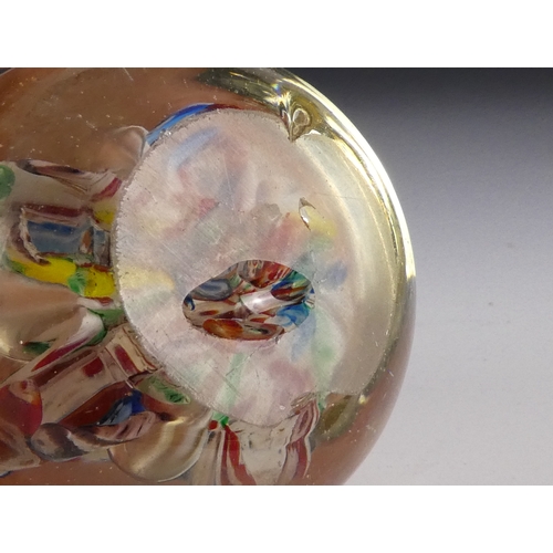 205 - A Wedgwood glass paperweight - set with an amber flower, 7cm diameter, together with four other simi... 