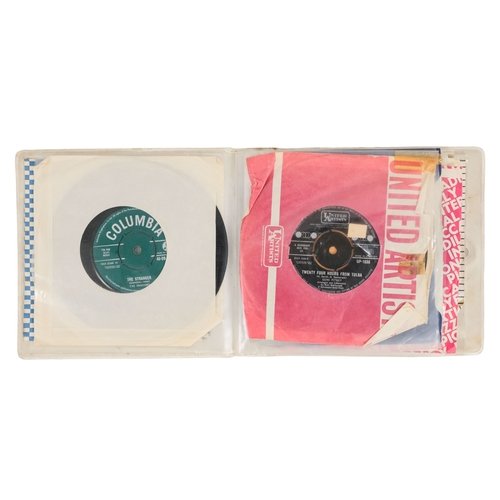 121 - A collection of 45rpm vinyl records - to include Chris Montez, Status Quo, The Moody Blues, James Br... 