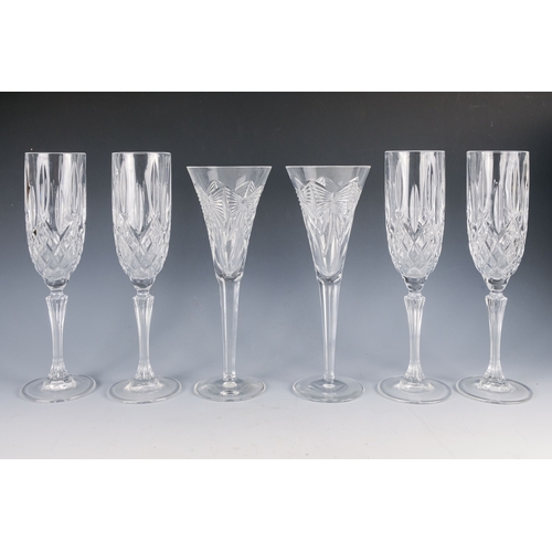 150 - A pair of Waterford crystal glass champagne flutes, boxed - together with four other champagne flute... 