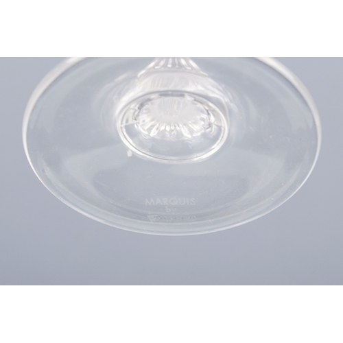 150 - A pair of Waterford crystal glass champagne flutes, boxed - together with four other champagne flute... 