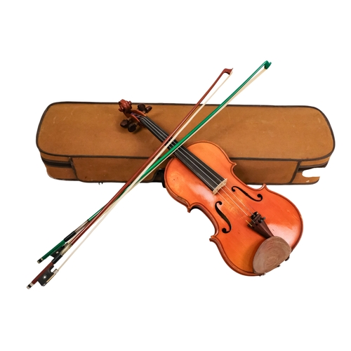 156 - A 20th century French violin - with a two piece back, together with two bows in a hard case with can... 