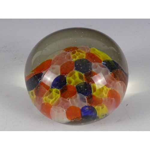 205 - A Wedgwood glass paperweight - set with an amber flower, 7cm diameter, together with four other simi... 