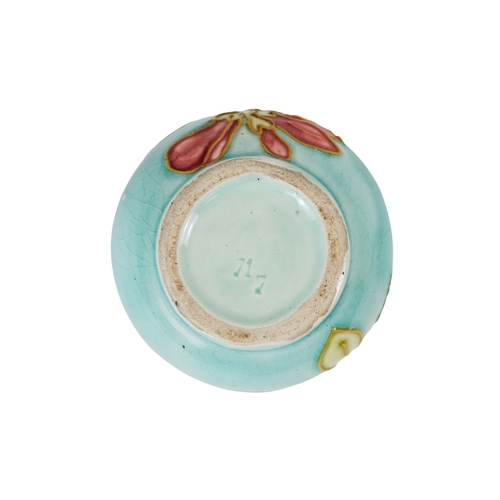 206 - A tubeline vase in the manner of Moorcroft - decorated with a leaf and flower on a pale blue ground,... 