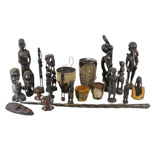 1155 - A collection of African carved hardwood figures - together with a walking cane, and four hide covere... 