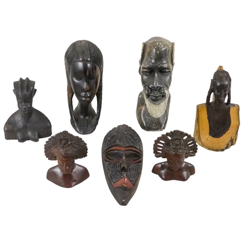1155 - A collection of African carved hardwood figures - together with a walking cane, and four hide covere... 
