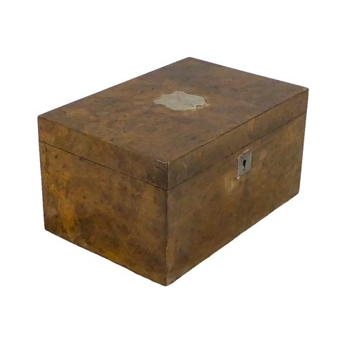 1156 - An early 20th century birdseye veneered box - rectangular with a white metal shield shaped vacant ca... 