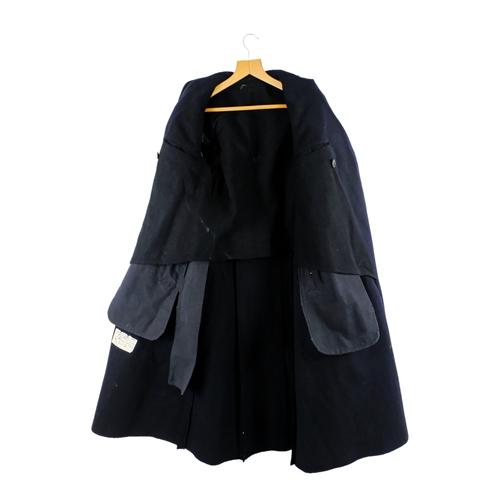 A woollen police officer's overcoat - dated 1953, fitted with Cornwall ...