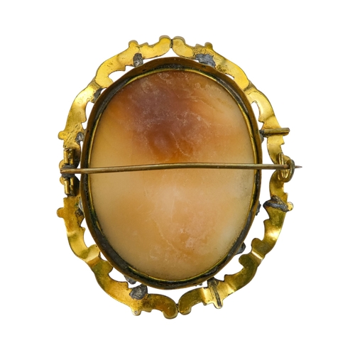 303 - An Italian 19th century cameo brooch - carved with a portrait of a young woman, within a foliate gil... 