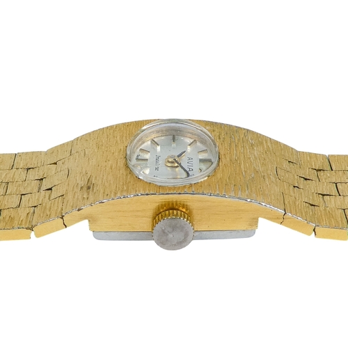 513 - An Avia ladies cocktail watch - the white oval dial set out with batons within ark finished case and... 