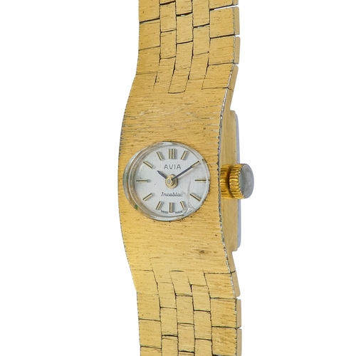 513 - An Avia ladies cocktail watch - the white oval dial set out with batons within ark finished case and... 
