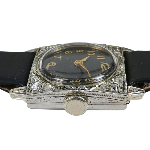 523 - A Vertex ladies cocktail watch - the 18ct white gold case set with diamonds, the circular dial set o... 