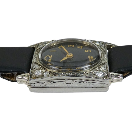 523 - A Vertex ladies cocktail watch - the 18ct white gold case set with diamonds, the circular dial set o... 