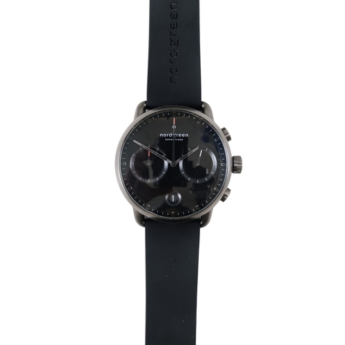 529 - A Nordgreen gentleman's wristwatch - the black dial with two subsidiary dials and date aperture, box... 
