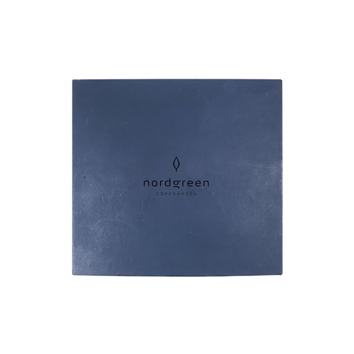 529 - A Nordgreen gentleman's wristwatch - the black dial with two subsidiary dials and date aperture, box... 
