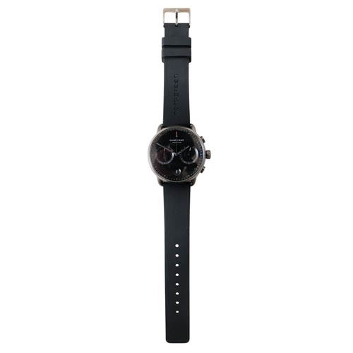 529 - A Nordgreen gentleman's wristwatch - the black dial with two subsidiary dials and date aperture, box... 