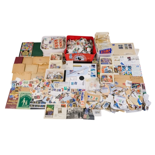 557 - A quantity of largely UK stamps - most on paper.