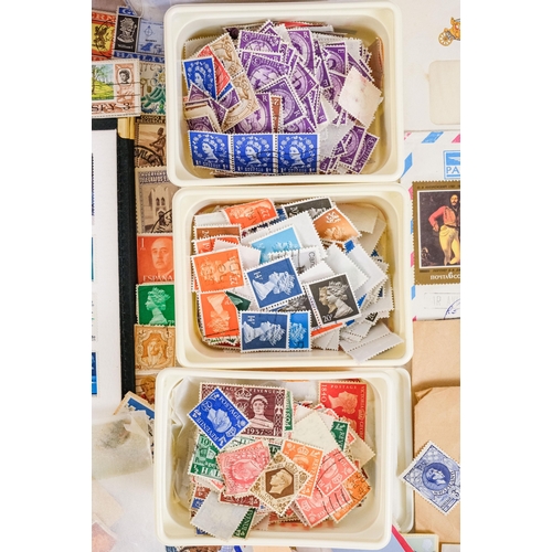557 - A quantity of largely UK stamps - most on paper.