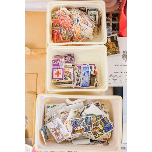 557 - A quantity of largely UK stamps - most on paper.