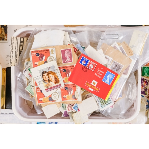 557 - A quantity of largely UK stamps - most on paper.