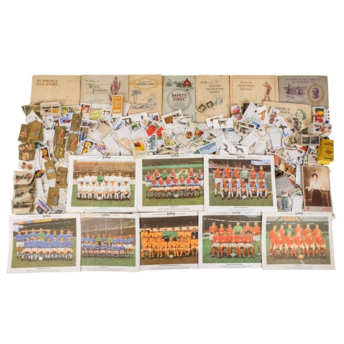 561 - A quantity of 20th century cigarette cards - various brands and subjects, together with eight Ty-Pho... 
