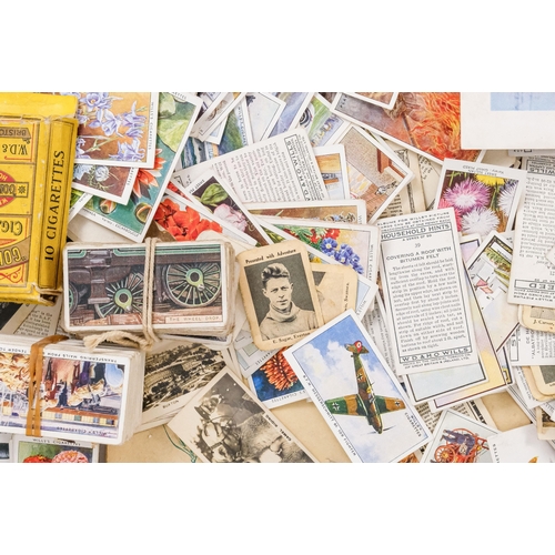 561 - A quantity of 20th century cigarette cards - various brands and subjects, together with eight Ty-Pho... 