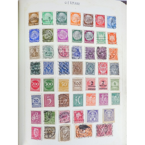 562 - An album of world and UK stamps - together with some loose stamps on paper and a First Day Cover.