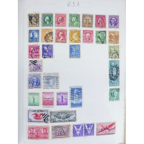 562 - An album of world and UK stamps - together with some loose stamps on paper and a First Day Cover.