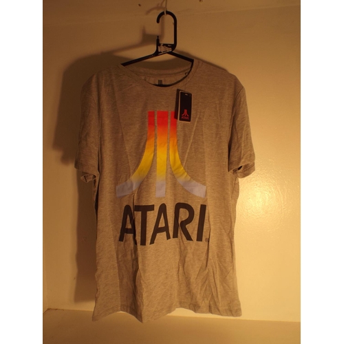 133 - New & tagged Atari t.shirt size 42/44