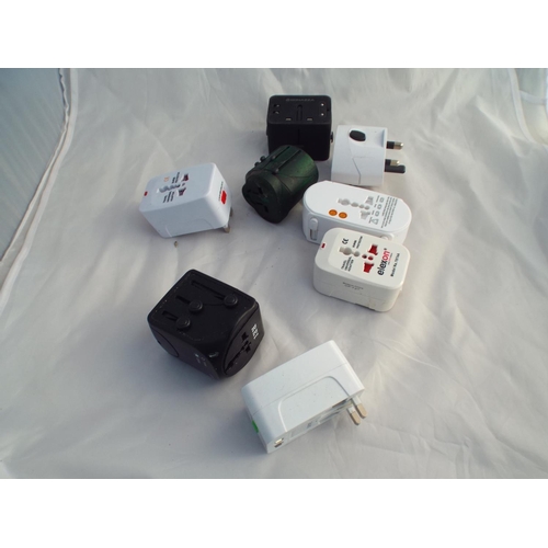 68 - Qty of travel adapters